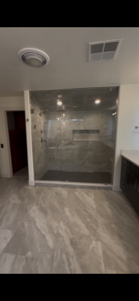 Transform your bathroom into a beautiful, functional space with our expert renovation services. We handle design, fixtures, tile, lighting, and finishes to deliver comfort, style, quality craftsmanship. for Everston Home in Littleton, CO