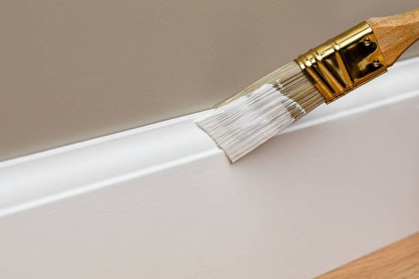 Enhance your home's elegance with our expert Trim Work services. We carefully paint and finish moldings, door frames, and baseboards to add a polished touch that complements any interior style. for Cooper Painting in Edinburg, IL