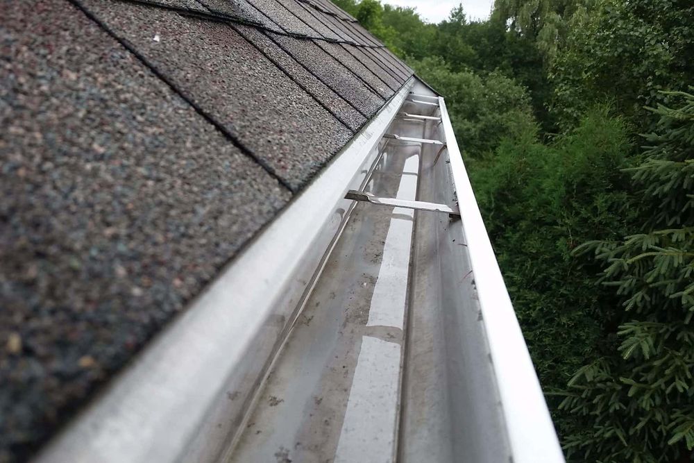 Our professional pressure washing company offers expert gutter cleaning services to homeowners, ensuring clog-free gutters and effective rainwater drainage. Protect your home from water damage with our reliable maintenance solutions. for HomeSlice Professional Home Services in Centennial, CO