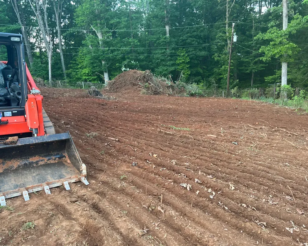 Our grading service ensures your property is level, safe, and ready for landscaping projects. Trust our experienced team to efficiently grade your land for optimal results. for Rescue Grading & Landscaping in Marietta, SC