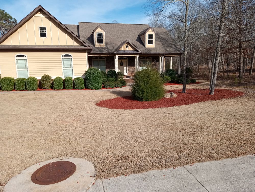 Mulch is used to help maintain the health of your landscape and adds a professional touch to any planter. It can be placed over soil to lock in moisture and improve soil conditions to encourage a healthier lawn. We provide a variety of professional mulching services. for Prime Lawn LLC in Conyers, GA