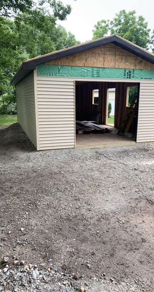 Enhance your home with our expert garage construction services, offering custom designs, quality materials, and skilled craftsmanship to create functional and stylish spaces tailored to fit your needs perfectly. for PKC Construction in Sterling, IL