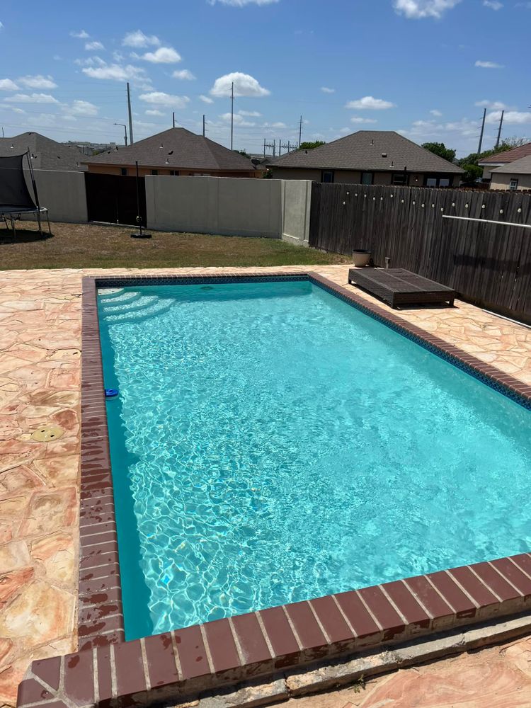 Enhance your pool area with our premium pool deck paving service, offering a wide range of durable and stylish options to create a beautiful and functional space around your new swimming pool. for Pool Queen Services in Eagle Pass, TX