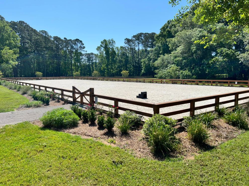 Our professional fence installation service enhances your property's security and aesthetics with durable, attractive equestrian fencing, tailored to suit any landscape and ensure safe boundaries for your horses. for SmithWorx Construction in Charleston, SC