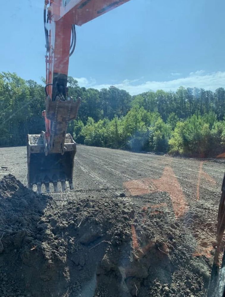 Our Excavation service efficiently prepares your property for construction by safely removing earth, ensuring a stable foundation while minimizing disruption and maintaining precision for all your grading needs. for Untamed Services in Shawboro, NC