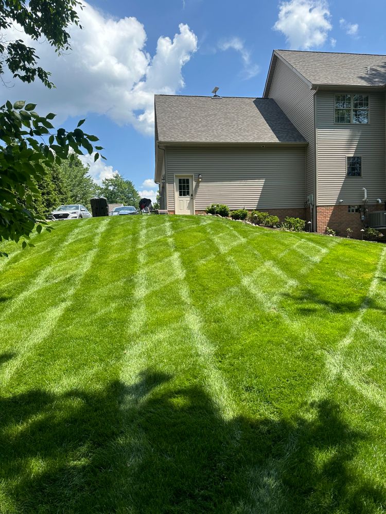 Our professional Lawn Mowing service ensures your yard stays well-manicured and healthy, giving your home a beautiful curb appeal that you can be proud of. Ask us about our 4 seasons contract! for Jenkins Landscaping & Property Management LLC in Clinton, OH