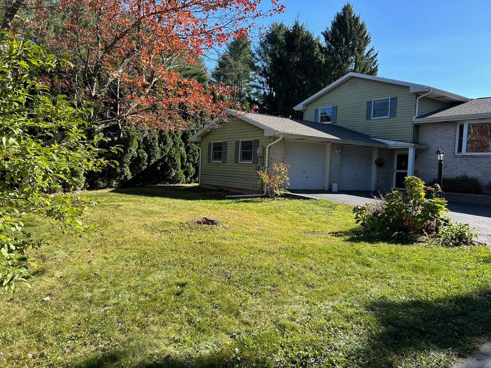 Our professional mowing service ensures a perfectly manicured lawn, enhancing your home's curb appeal with precision cutting and regular maintenance for a thriving, lush green landscape all season long. for K Enterprises in Tamaqua, PA
