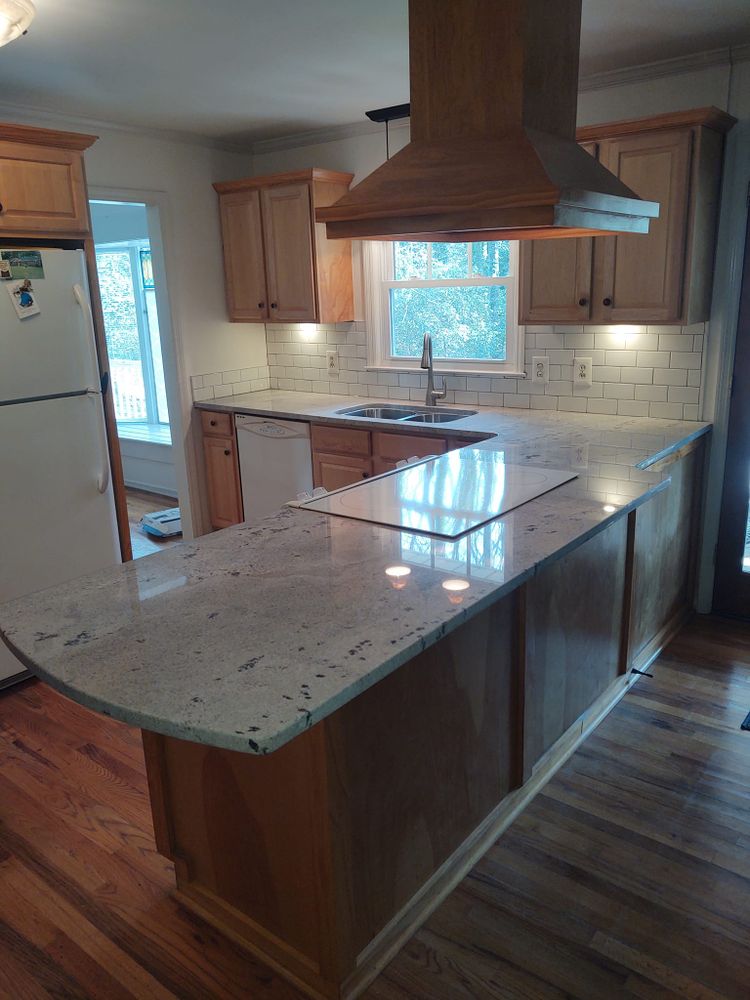 Transform your kitchen into a functional and stylish space with our expert renovation service. From custom cabinets to modern appliances, we'll bring your dream kitchen to life with precision and quality craftsmanship. for Garrett Ferguson & Sons in Simpsonville,, SC