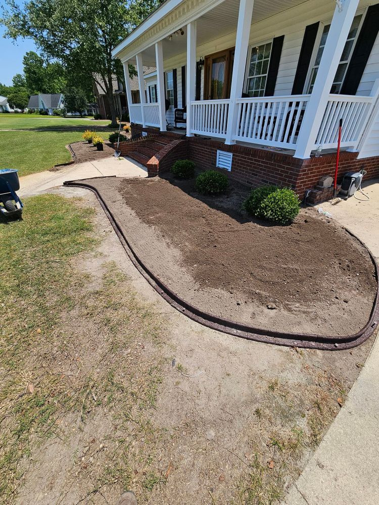 Enhance your outdoor space with our expert Garden Design service, transforming your lawn into a vibrant, personalized retreat. We create stunning landscapes tailored to suit your style and needs. for Natures Accent in Wilson, NC