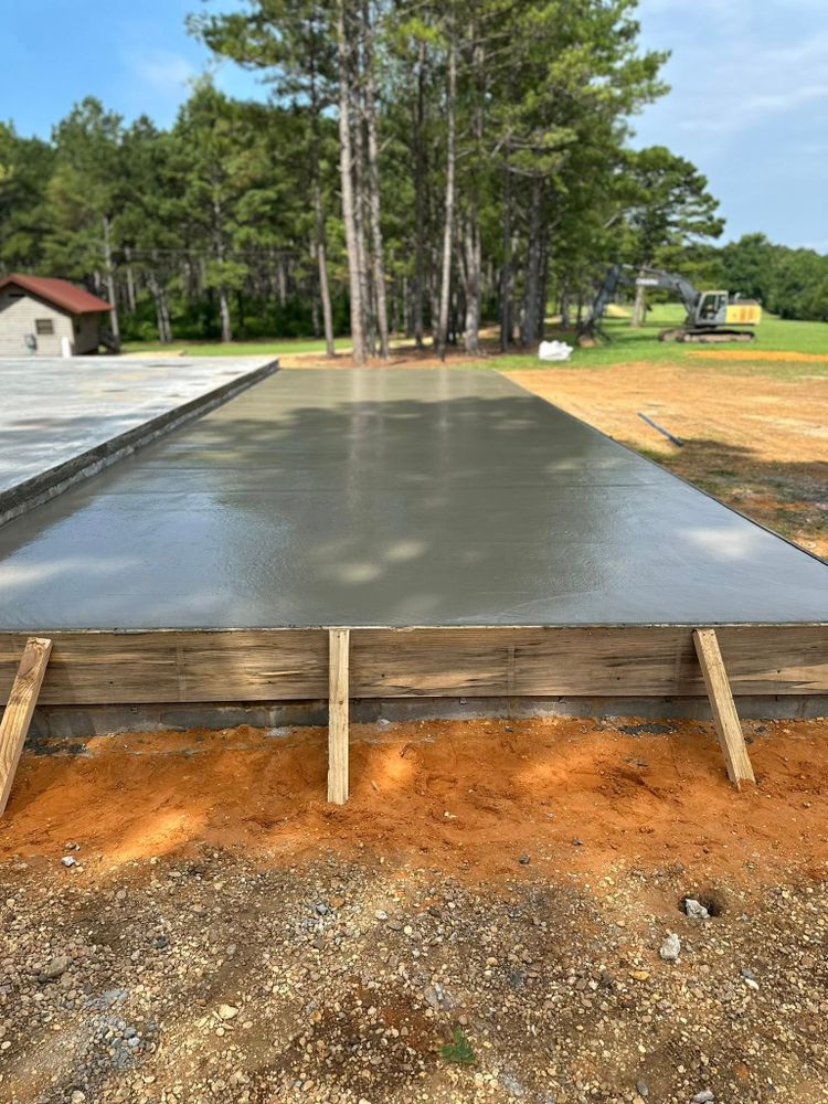Transform your home with our expert concrete services, offering durable driveways, stunning patios, and custom designs that enhance curb appeal while ensuring longevity and quality craftsmanship for every project. for Kings Concrete & Construction in Tuscaloosa, AL