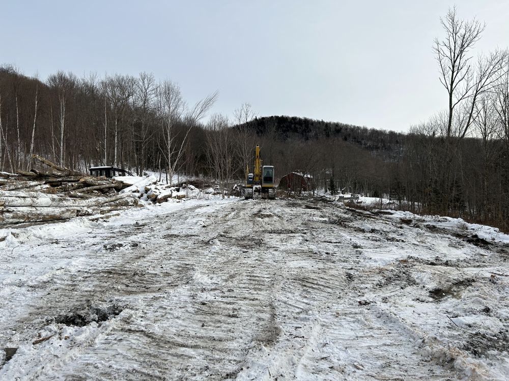 Carving a Pond into a Mountain Side for Andy Naylor Excavation in Johnson, VT