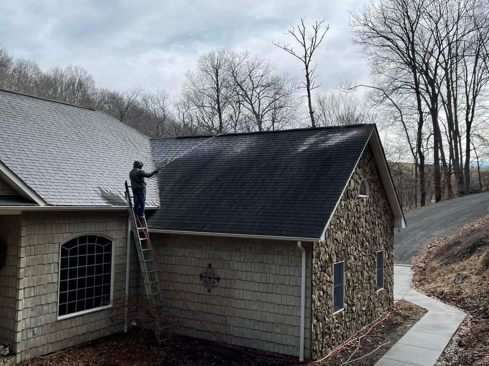 Revitalize your roof's appearance with our expert roof washing service. Remove dirt, grime, and mold to enhance curb appeal and extend the life of your roof between roofing repairs. for EJ Roofing in Sparta, North Carolina