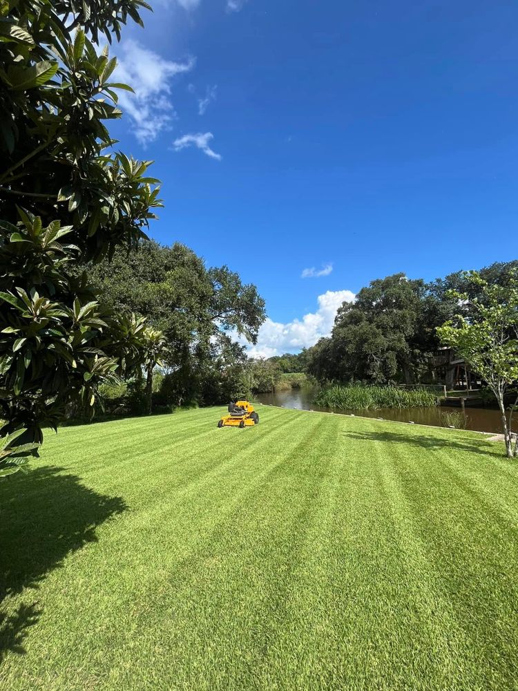 Enhance your home's curb appeal with our professional mowing service. We promise precise, timely cuts and immaculate edging to ensure a clean, well-maintained lawn that you're proud to showcase. for Bayou Blades LawnCare LLC in Lafayette, LA