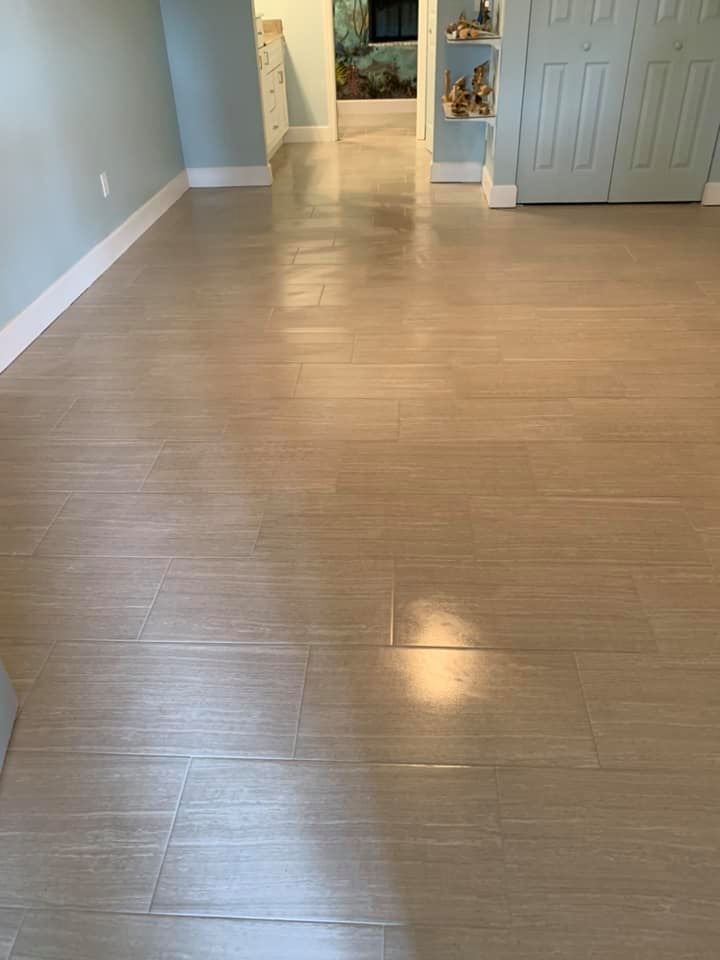 Enhance your bathroom with our expert flooring services, offering a wide selection of durable and stylish options to elevate both the appearance and functionality of your space. for Dean's Home Renovations LLC in Port St. Lucie, Florida