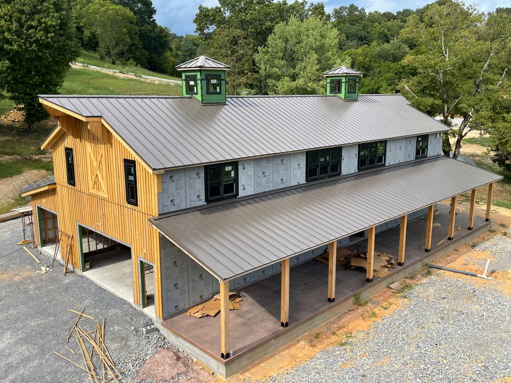 Our Standing Seam Metal Installation service offers homeowners a durable, weather-resistant roofing solution that combines sleek aesthetics with long-lasting performance, ensuring your home is protected and visually appealing for years to come. for Lumen Constructions in Lobelville, TN