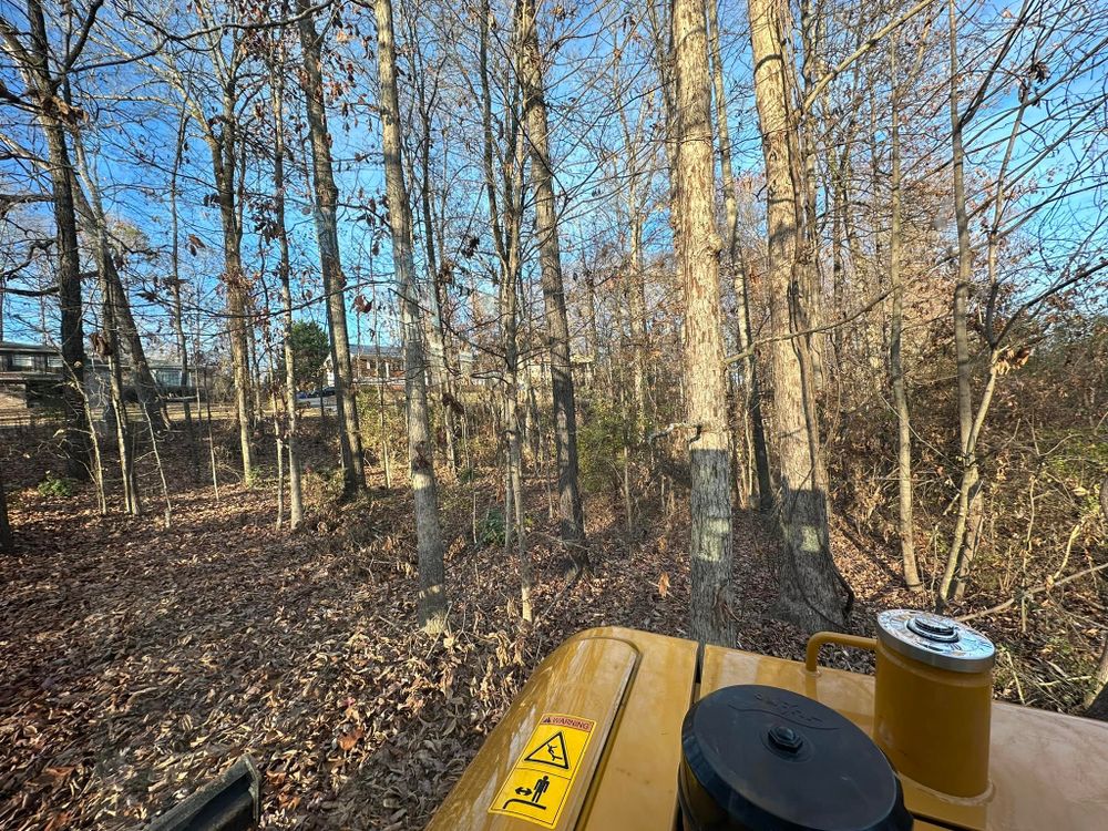 Our expert Land Clearing service offers efficient and environmentally-friendly removal of trees, brush, and debris, transforming your property into a clean slate for development or landscaping while prioritizing safety and sustainability. for TN DIRT PROS in Cleveland, TN