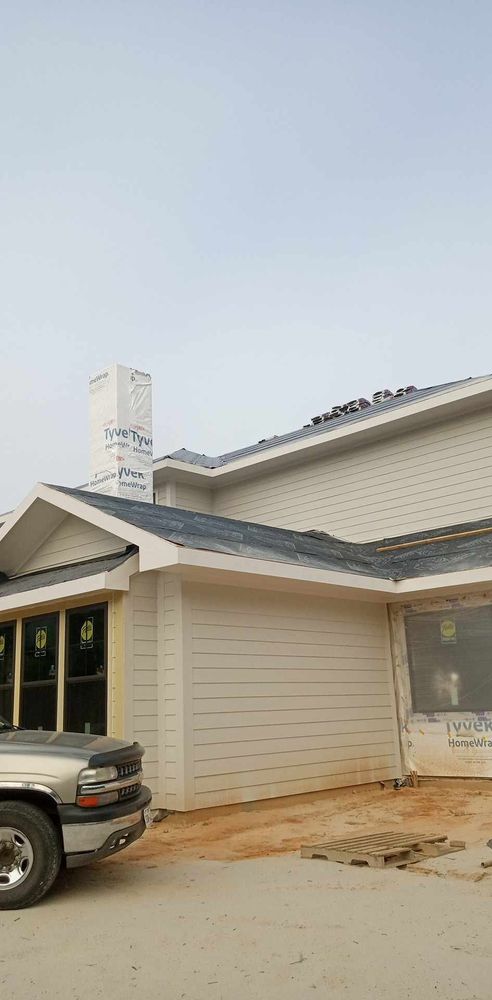 Our Roofing Replacement service provides homeowners with expert installation using high-quality materials, ensuring durability and enhanced curb appeal while offering reliable protection for your home against various weather conditions. for Forrest White Roofing in Pollok, TX
