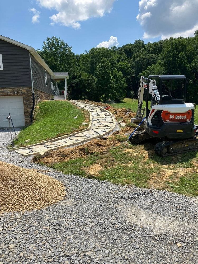 Our Skid Steer Work service offers precise, efficient land clearing and grading for homeowners, ensuring your property's landscaping projects are executed seamlessly with minimal disruption to existing surroundings. for Genesis Landworks in Bluff City, TN