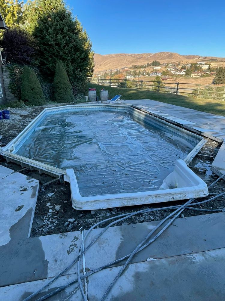 Transform your backyard into a personal oasis with our expert pool installation services, ensuring precision excavating and seamless integration for a stunning, durable swimming experience tailored to your home landscape. for Perez Excavation LLC in Monitor, WA