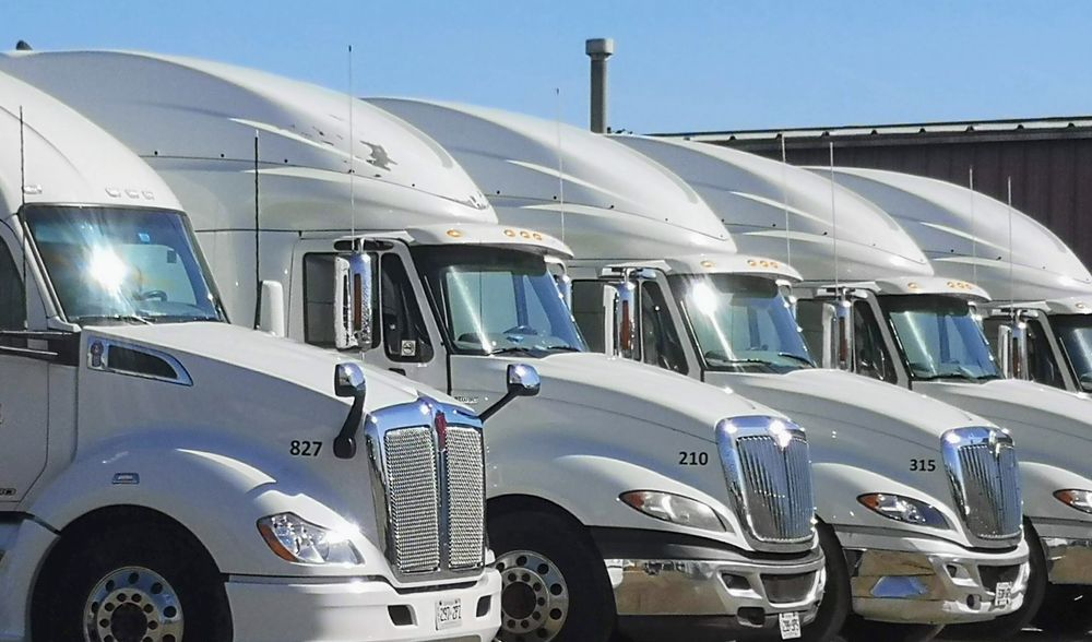 Our Semi Fleet Cleaning service keeps trucks, trailers, and work vehicles spotless with professional pressure washing and soft washing solutions that protect surfaces, complement roof cleaning services, and enhance your property’s appearance. for Blast Brothers Pressure/Soft Wash LLC in Covington, VA