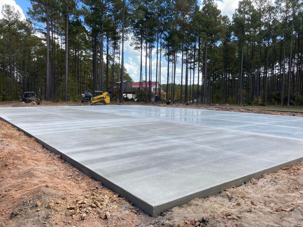 Transform your home’s foundation with our reliable concrete slab construction service, offering durability and precision. Our expert team ensures a flawless installation for lifelong stability and peace of mind. for Palmetto Precision Concrete & More in Bethune, SC