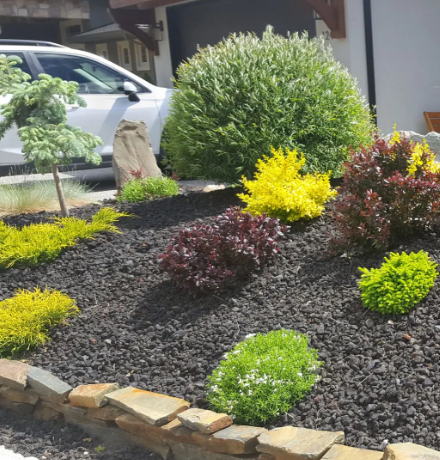 Our mulch installation service refreshes your landscape with clean, professionally applied mulch that improves curb appeal, helps retain moisture, reduces weeds, and protects plant roots for a healthier outdoor space. for Turf Titan in Lake City, FL