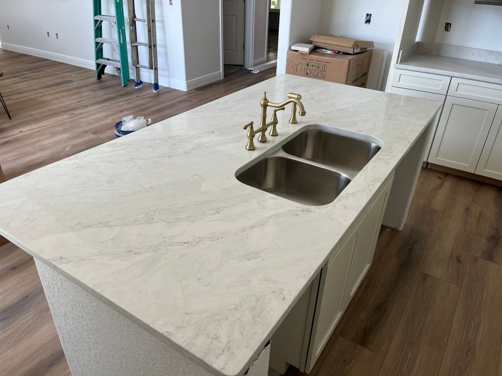 Transform your kitchen or bathroom with our expert Quartz countertop installation service, offering precision craftsmanship and exceptional quality to enhance your home's elegance and functionality, ensuring lasting beauty and durability. for Supreme Stone in Ocala, FL