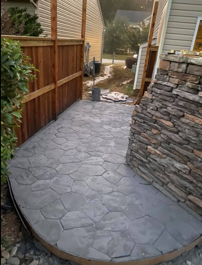 Enhance your outdoor living space with our expertly crafted patio design and construction services, combining functionality and beauty to create a perfect setting for relaxation and entertaining. for JIF Concrete Services in Greenville, SC