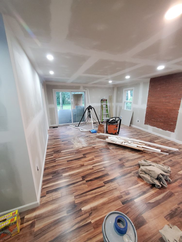 The Custom Staining service can help you achieve the perfect look for your wood floors, cabinets, and furniture. We also have a line of paint exclusively for vinyl exteriors. Our experienced and detail-oriented team will work with you to choose the perfect color and finish for your project, and we will take care of all the staining and finishing work ourselves.  for Painless Painting And Drywall Repair LLC in Rochester, NY