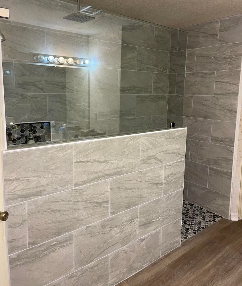 Transform your home with our professional bathroom renovation service. Our experienced team will upgrade your space, enhancing both functionality and aesthetics to create the bathroom of your dreams. for CWC Custom Homes & Barndominiums in Snook, TX