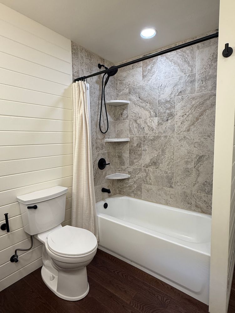 Transform your bathroom into a modern, functional space with our expert renovation services. We focus on quality craftsmanship and personalized design to enhance comfort and style in every detail. for Mill Creek Builders in Empire, CO