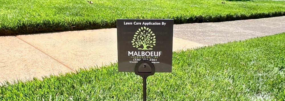 Our Fertilization and Weed Control Programs ensure your lawn thrives year-round by providing essential nutrients and effective weed management. Enjoy a lush landscape with expert care tailored to your lawn's specific needs. for Malboeuf Landscaping, Inc in Kernersville, NC