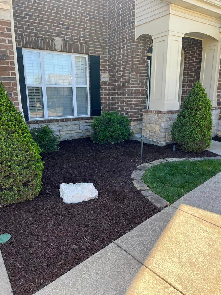 Our Mulch Installation service offers homeowners an easy way to improve the look of their landscaping, suppress weeds, retain moisture in soil, and provide nutrients for plants. Let us enhance your outdoor space today! for Green Sweep Lawn and Landscape in Eureka, MO