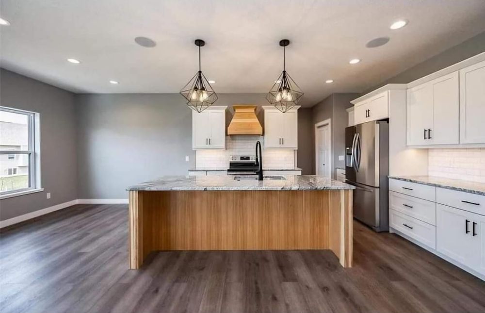 Transform your kitchen into a functional and stylish space with our expert renovation service. From updated cabinets to modern appliances, we'll bring your dream kitchen to life with quality craftsmanship. for AKM Construction & Contracting in Ely, IA