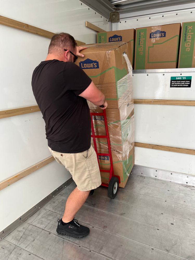 Our professional movers will quickly and efficiently unload your rental truck, carefully handling your belongings and placing them in the desired rooms of your new home to ensure a stress-free moving experience. for Erikson Movers in Pea Ridge, Arkansas