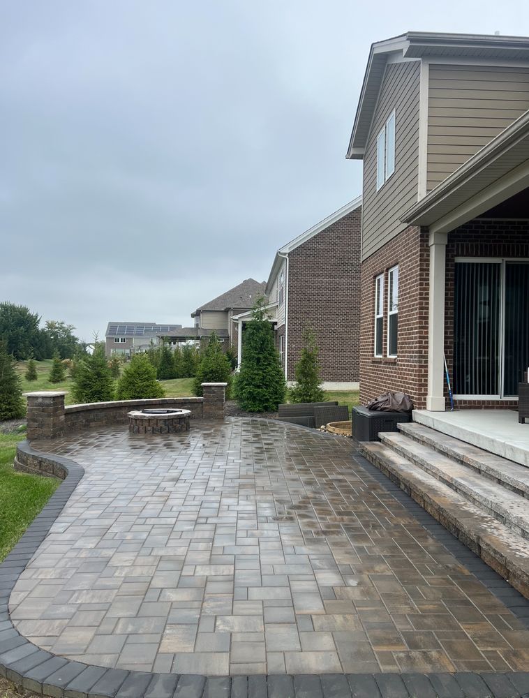 Our Paver patio service transforms your outdoor space into a beautiful, durable, and low-maintenance area perfect for entertaining or relaxing. Enhance your home with our expert installation. for Woolf Outdoor Services in Mason, OH