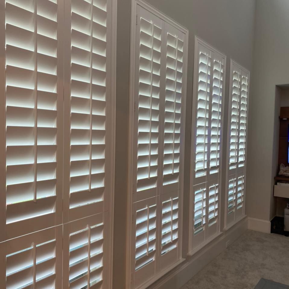 Our Plantation Shutters service offers homeowners a timeless and stylish window treatment option that enhances privacy, controls light levels, and adds value to their home with expert installation by our team. for Deluxe Window Solutions in Houston, TX