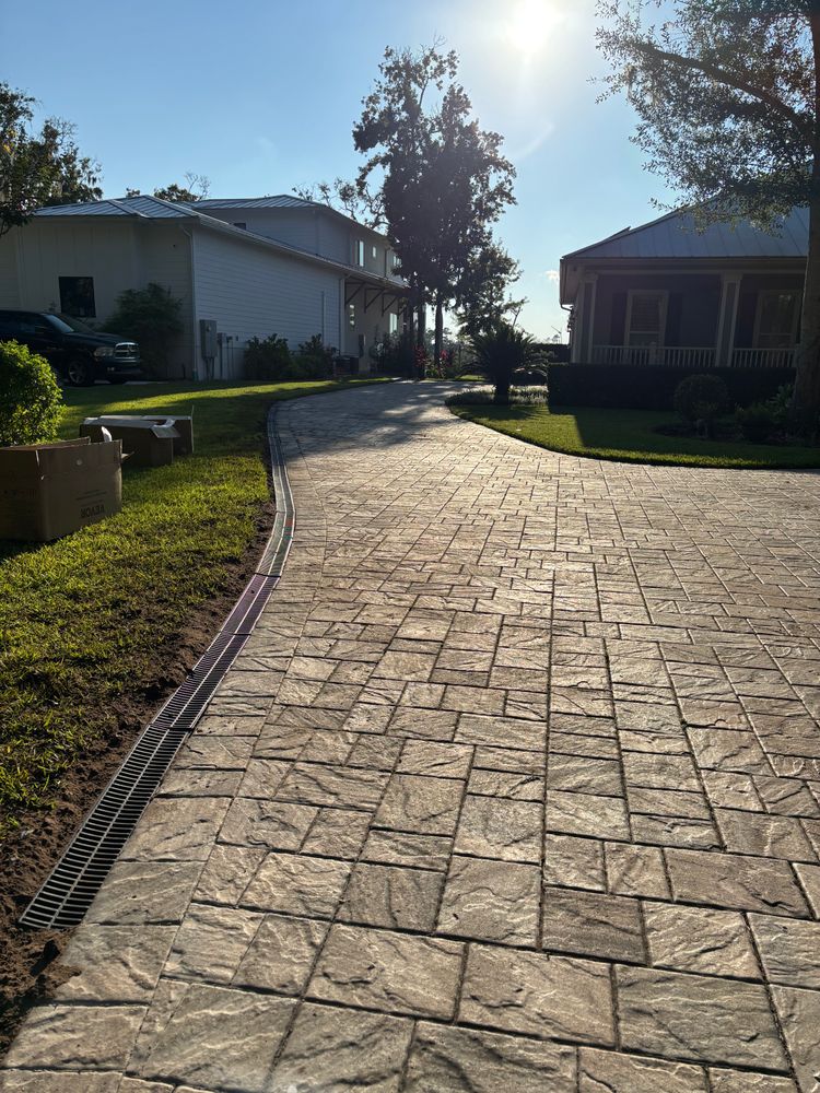 Our Drainage System Install & Repair service ensures your landscape remains healthy and beautiful by effectively managing water flow, preventing erosion, and protecting your property from potential water damage. for U-Call-It Lawncare & Landscaping in Jacksonville, FL