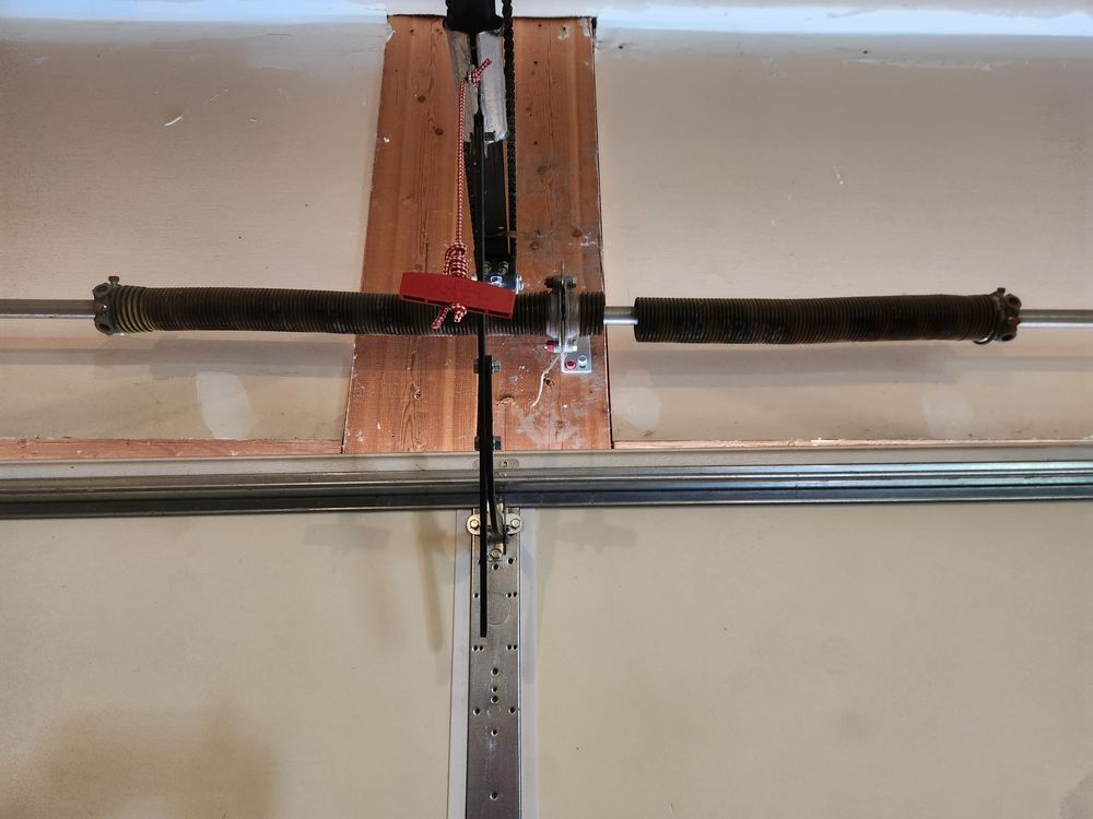 Our expert spring repair service guarantees smooth functioning of your garage door, addressing issues promptly and efficiently to ensure safety and reliability for your home’s entrance every time. for Absolute Doors in Hyrum, UT