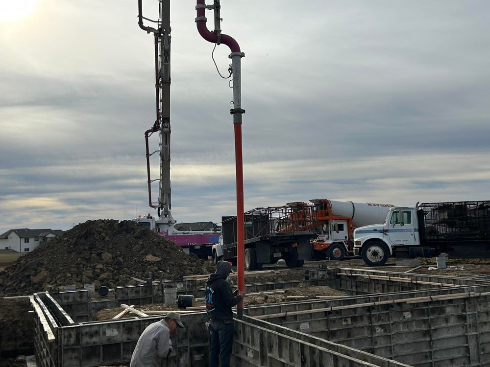 Our concrete services ensure precision and durability, delivering expertly poured foundations and surfaces. Trust our skilled team for reliable results that enhance your home's value and functionality with top-notch concrete pouring solutions. for Omni Construction Product in Wichita, KS
