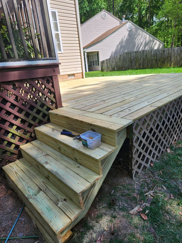 Our Patios and Decks service aims to transform your outdoor space into a comfortable and inviting area for entertaining or relaxing. We offer expert design, construction, and maintenance to enhance your home's value. for Jose's Lawn Care & Tree Service in Williamsburg, VA