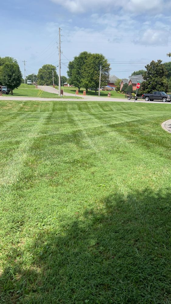 Our professional mowing service ensures a pristine, well-manicured lawn, enhancing your home's curb appeal with precision cutting and edging tailored to your grass type and landscape needs for optimum health. for Southern Hardscape’s & Landscaping in White House, TN