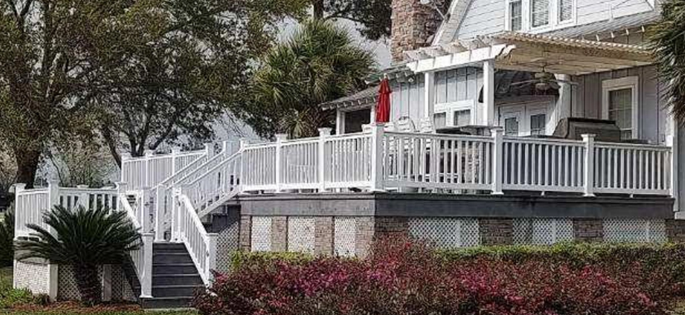 We feature Grand Manor vinyl rail for decks and porches. Available in square pickets, colonial pickets, and aluminum pickets. Railing is custom fabricated by Corbitt Vinyl Products for exact fit and hassle free installation, for Corbitt Vinyl Products in Hazlehurst, GA