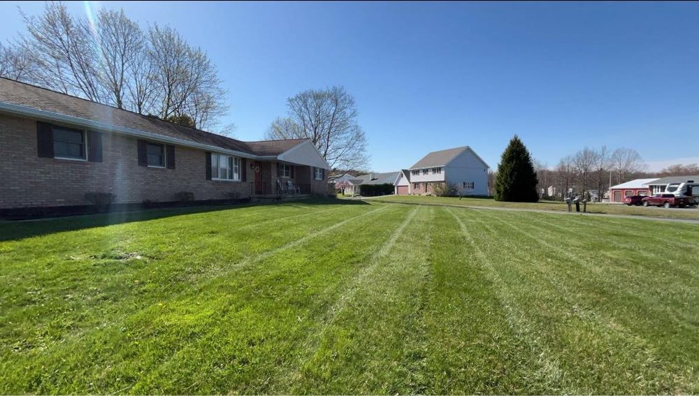 Enhance your lawn's health with our professional aeration service, ensuring improved soil airflow, nutrient absorption, and robust grass growth for a greener, more vibrant landscape that thrives year-round. for K Enterprises in Tamaqua, PA