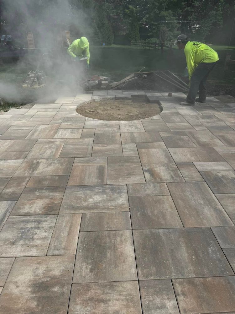 Our masonry services offer expert craftsmanship in creating durable and aesthetically pleasing structures, enhancing your home's beauty and value with skilled brickwork, stonework, fireplaces, patios, walkways, and retaining walls. for Alvarez Pavingstone INC. in Lyons, IL