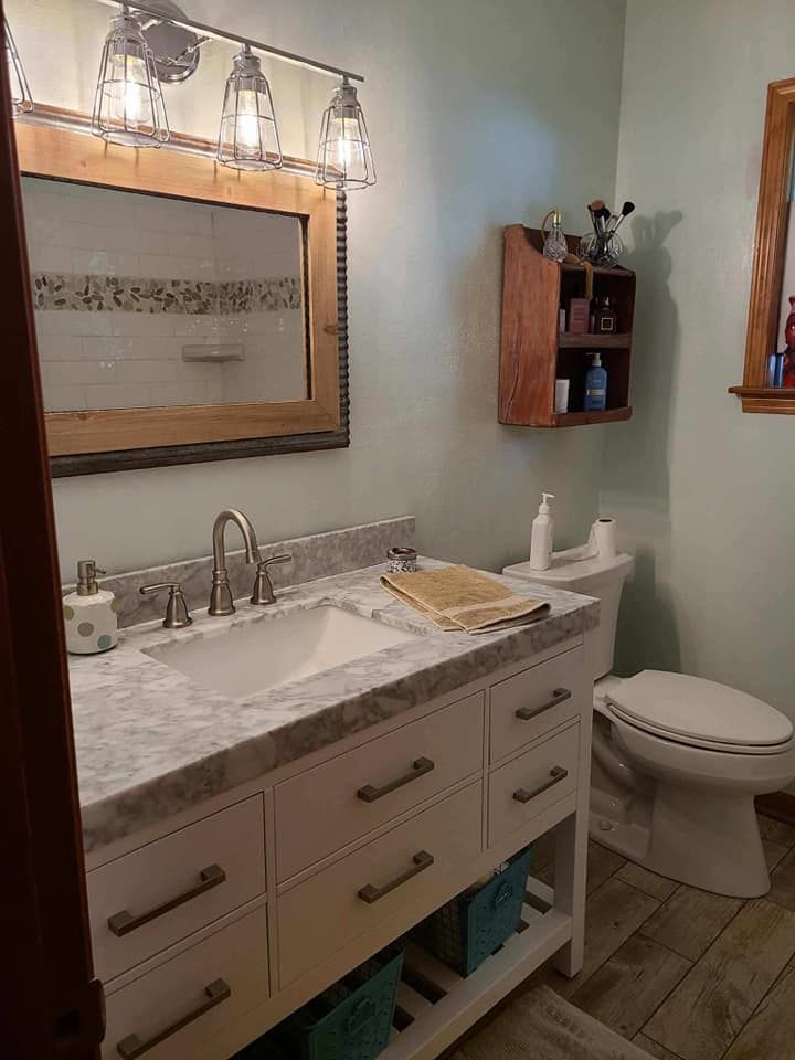 Transform your outdated bathroom into a luxurious oasis with our expert renovation service. We specialize in updating fixtures, flooring, and layout to create the perfect space for relaxation and rejuvenation. for Lind Boomer Flooring, Remodeling & Construction in Loves Park, IL