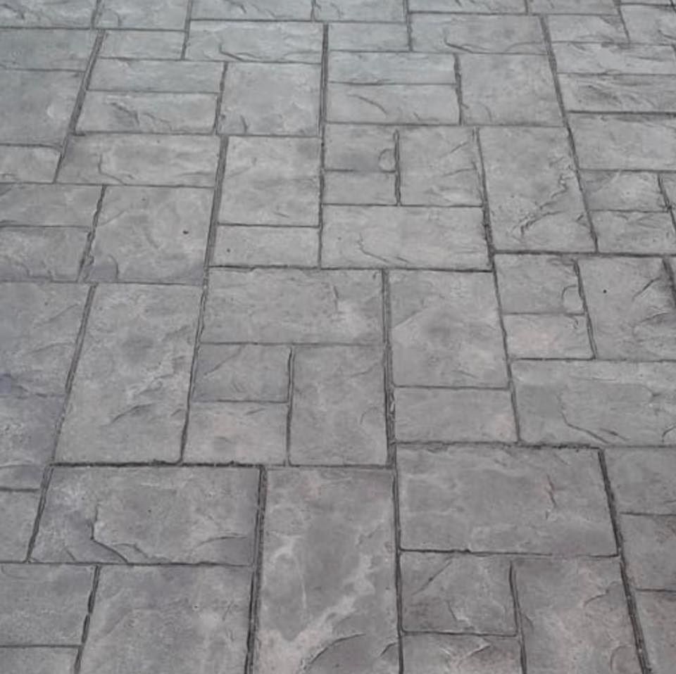 Enhance your home's aesthetics with our Decorative Concrete service, providing stunning, customizable designs including stamped and stained concrete options to transform patios, driveways, and walkways into beautiful focal points. for Inline NW in Seattle, WA