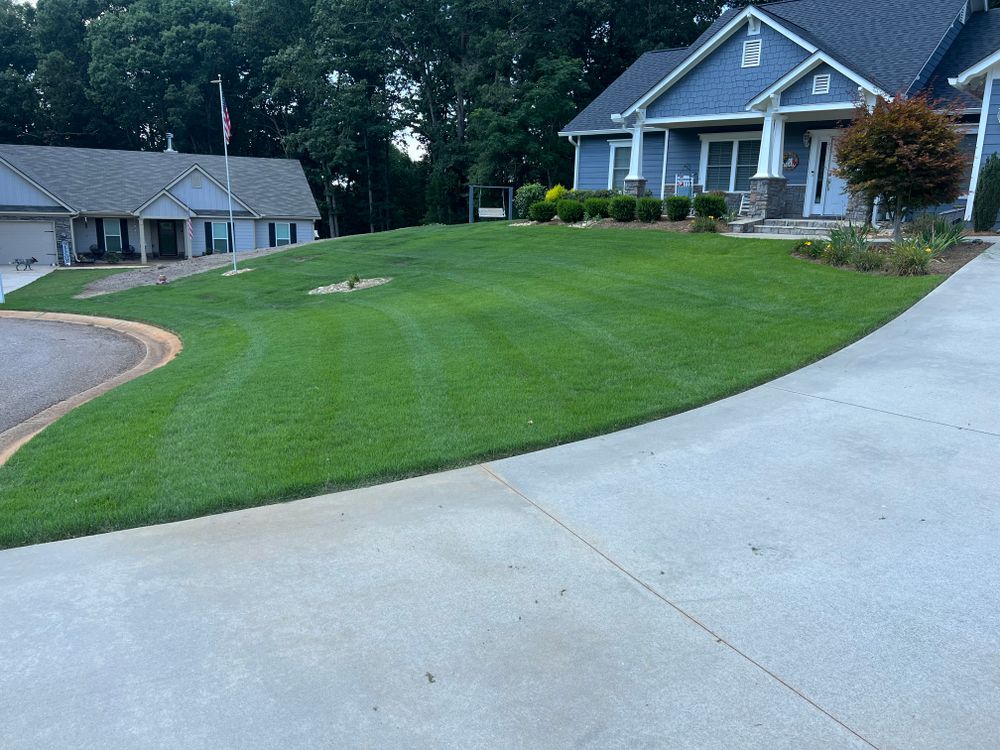 Our Lawn Maintenance service is the perfect solution for busy homeowners who want a well-manicured lawn without the hassle of doing it themselves. We offer weekly or biweekly visits from one of our experienced professionals, who will take care of everything from mowing to edging to weed control. for LC Lawn Care & Landscaping in Canon, GA