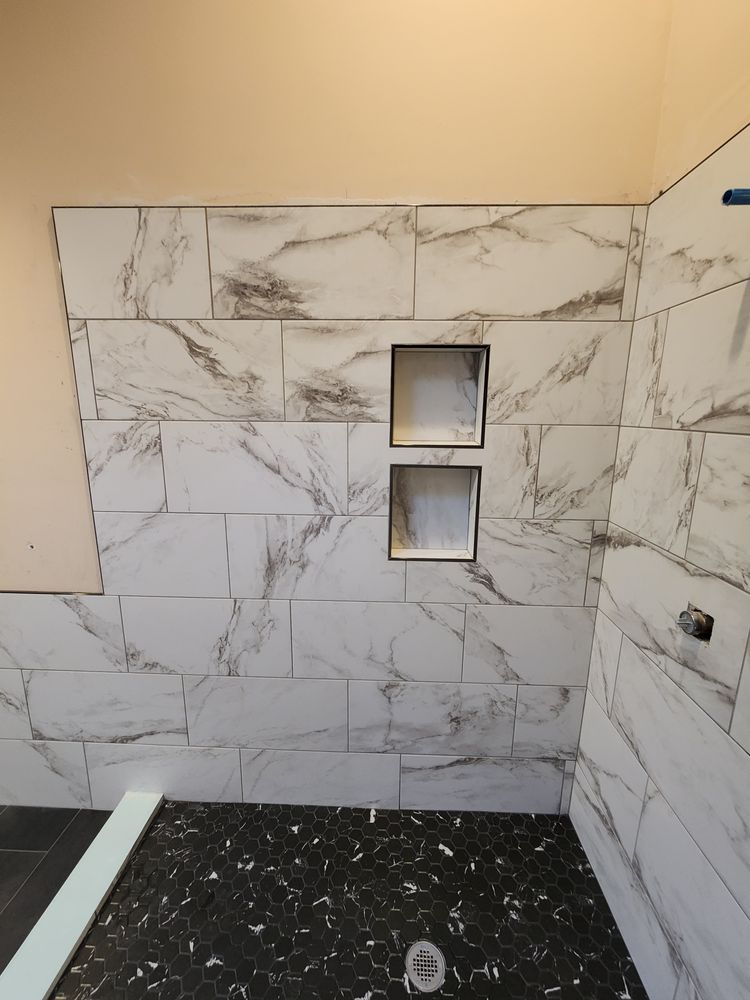 Transform your bathroom with our expert remodeling service. From design to installation, we deliver high-quality tile work that enhances aesthetic appeal and functionality, creating the perfect sanctuary in your home. for Elite Custom Tile Installations in Ocala, FL