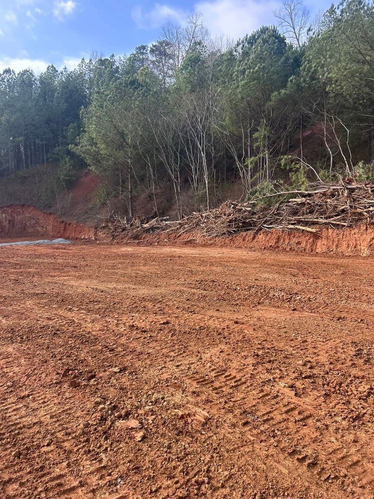 Our Land Clearing service efficiently removes trees, shrubs, and debris to prepare your property for construction or landscaping. We ensure a clean, safe site using professional equipment and environmentally friendly practices. for F.C. White’s Excavation & Drain Cleaning in Huntingdon, TN